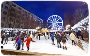 Pista di pattinaggio su ghiaccio a Rivoli, con ruota panoramica.